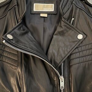 Like new Women’s Black Michael Kors leather jacket. Great detail, “badass”